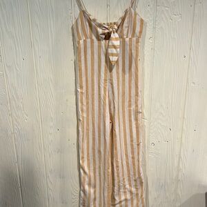 Cisono jumpsuit with tie peek at breast size Medium